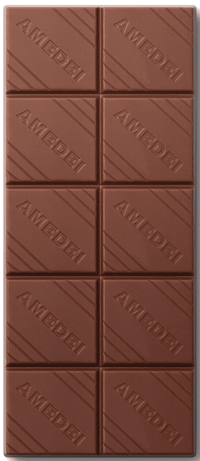 Close-up of six chocolate squares with "AMEDEN" embossed.