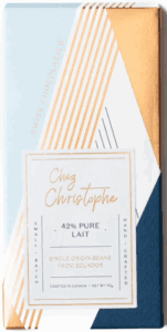 Chocolate bar labeled 'Chez Christophe 42% Pure Lait'.