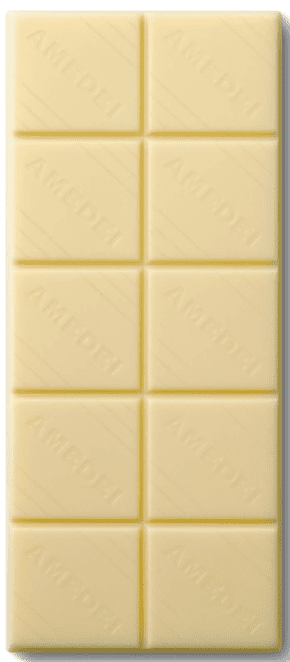 Close-up of white chocolate bar with six segments.
